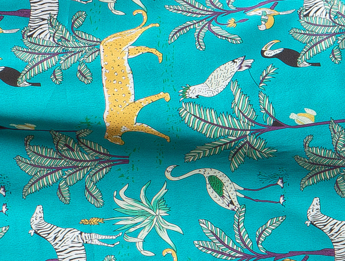 Lomami Leopard teal satin fabric with jungle animal print